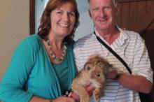 Anne-and-Barry-and-baby-lion-020513-cropped
